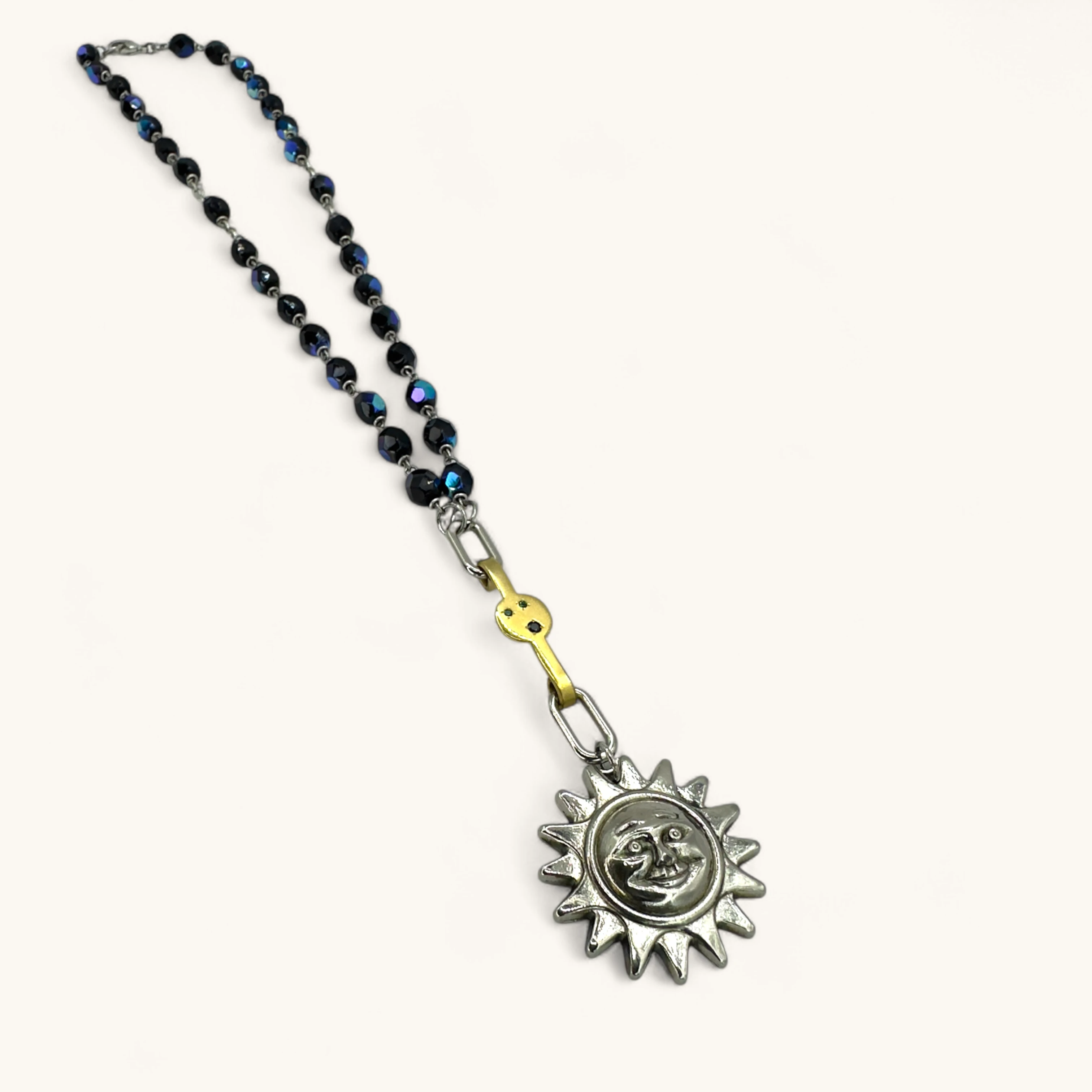 The Moonlight Sun Amulet | Gold Plated. Zircon. Sapphire.